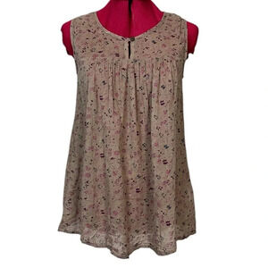 Crazy Doll sleeveless blouse with yoke, button closure, allover floral pattern
